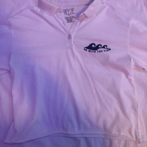 cropped white long sleeve with small design